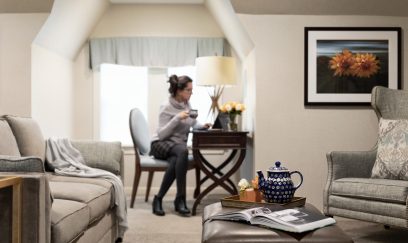 woman-relaxing-in-glidden-house-suite-321